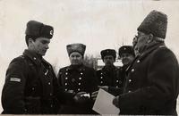 Фото. Маршал СССР Москаленко К.С. (справа) награждает Адгамова А.М. 1940-е