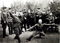 Фото. Герой Советского Союза С.А. Ахтямов (с гармонью) с однополчанами во время  празднования дня Победы. Май 1945